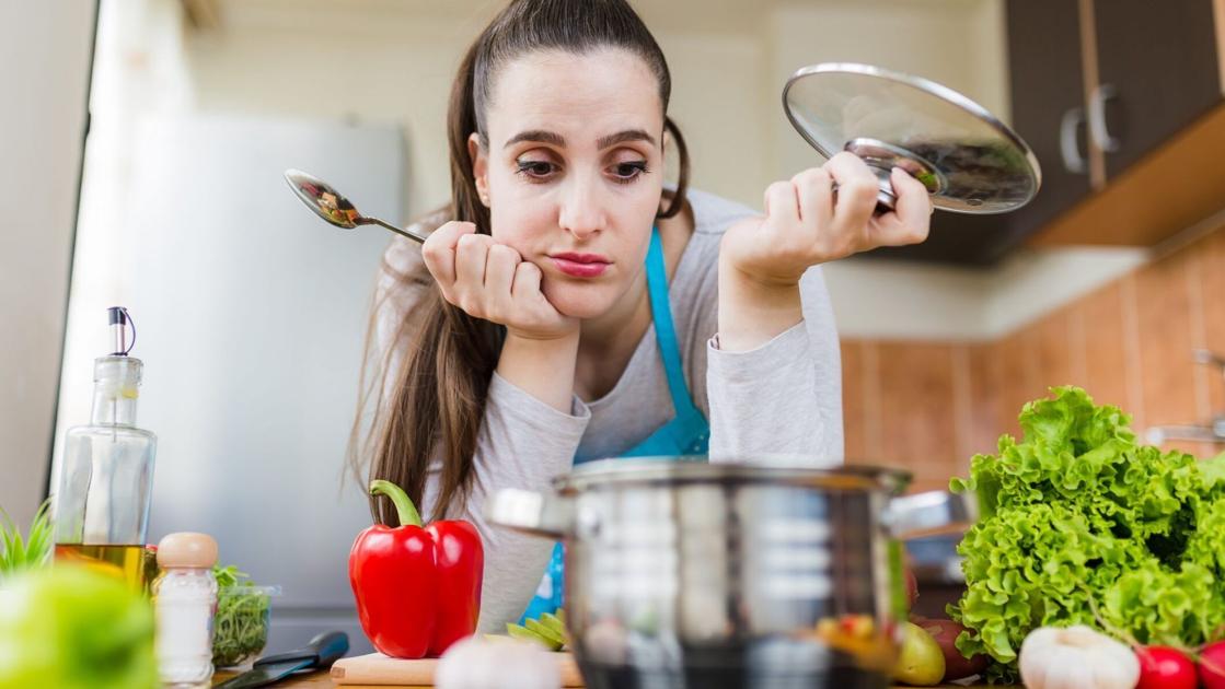 A person preparing food in a kitchen